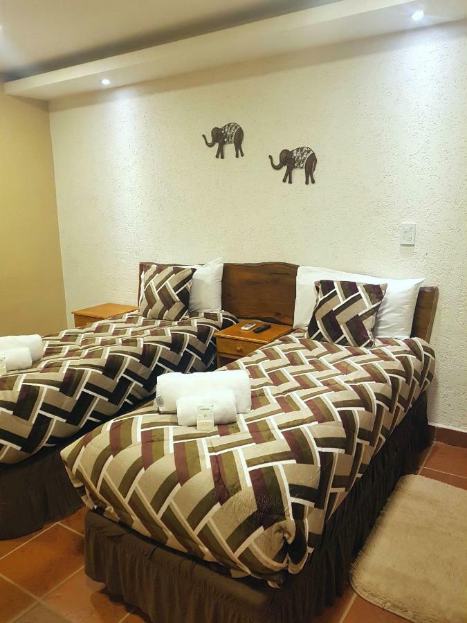 Ambay Suites & Dorms Puerto Iguazú Zewnętrze zdjęcie